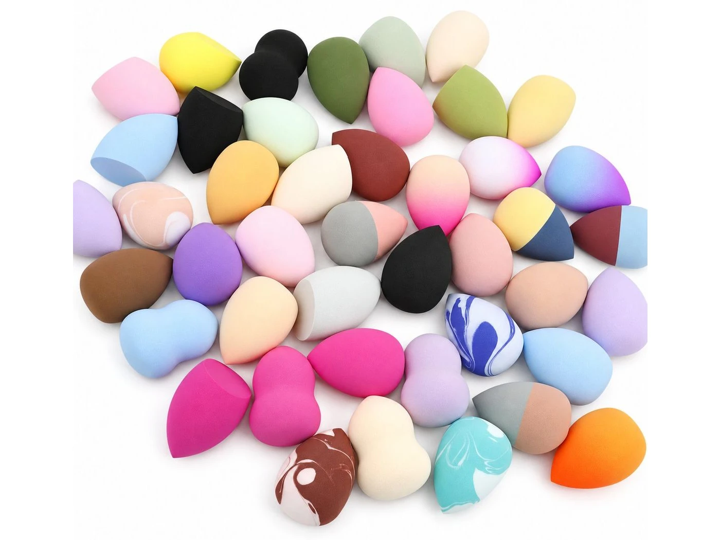 Beauty Tools — assorted multicolour teardrop beauty sponges on a white background